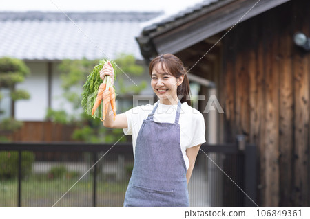 A cute woman living in the countryside A cute woman living in the countryside 106849361