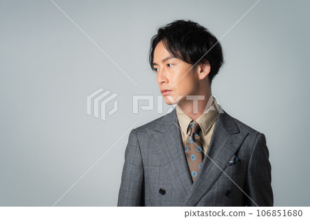 Men in their 30s in double suits Men in their 30s in double suits 106851680
