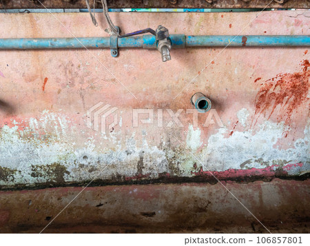 Closeup of the old faucet on the sink row. 106857801
