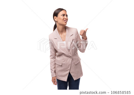 portrait of a young slender brunette business woman with ponytail dressed in a jacket and jeans portrait of a young slender brunette business woman with ponytail dressed in a jacket and jeans 106858585