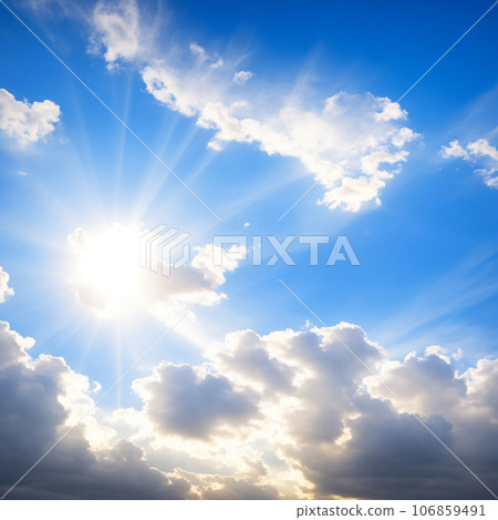 Blue sky background with tiny clouds and sun rays Blue sky background with tiny clouds and sun rays 106859491