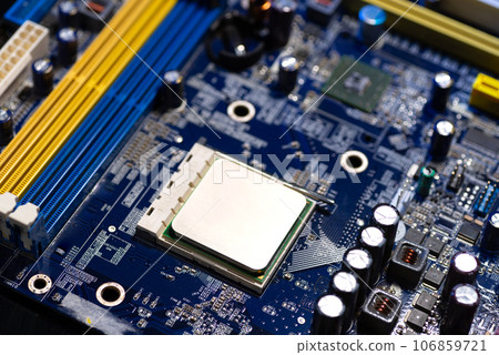 Motherboard close-up with contacts, desktop PC. Computer technology hardware components background 106859721