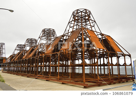 Photographing the manufacturing process of steel fishing reefs at Hakodate Port West Pier in Hakodate City, Hokkaido in early autumn. 106861079