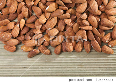 Heap of roasted almonds Heap of roasted almonds 106866883