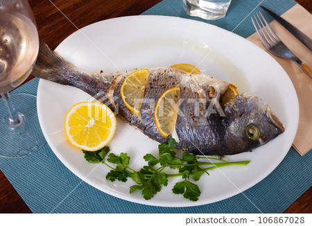 Baked in oven dorado fish Baked in oven dorado fish 106867028