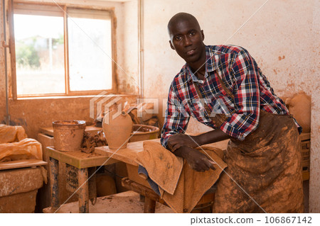 Pottery artist in ceramics studio Pottery artist in ceramics studio 106867142