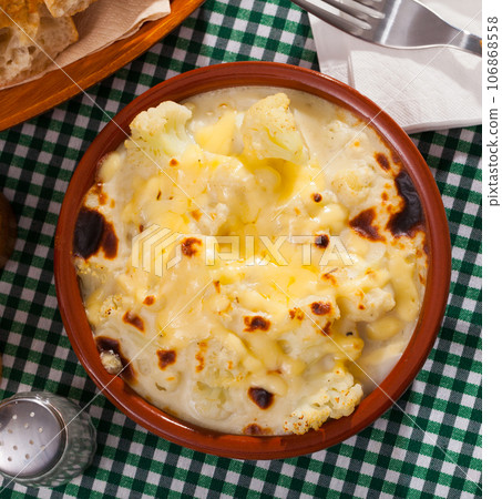 Appetizing cauliflower and cheese casserole for breakfast 106868558