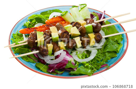 Chicken hearts skewers with avocado Chicken hearts skewers with avocado 106868718