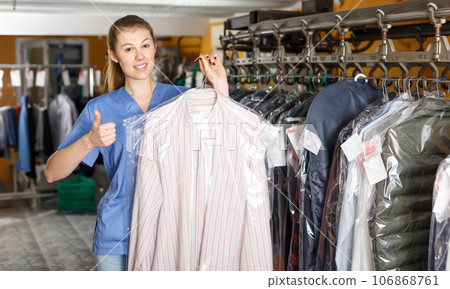 Portrait of female dry-cleaning salon worker 106868761