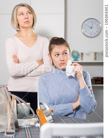 Offended woman and daughter Offended woman and daughter 106868901