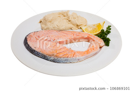Slightly fried salmon with hummus Slightly fried salmon with hummus 106869101