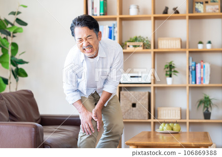 Senior man with joint pain Senior man with joint pain 106869388