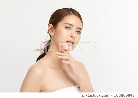 Beautiful young asian woman with clean fresh skin on white background, Face care, Facial treatment, Cosmetology, beauty and spa, Asian women portrait. Beautiful young asian woman with clean fresh skin on white background, Face care, Facial treatment, Cosmetology, beauty and spa, Asian women portrait. 106869942