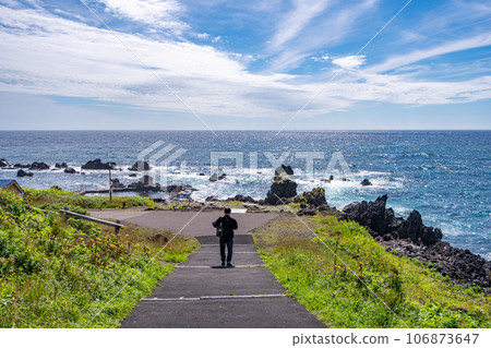 Senboshi Misaki Coast Male rider back view Senboshi Misaki Coast Male rider back view 106873647