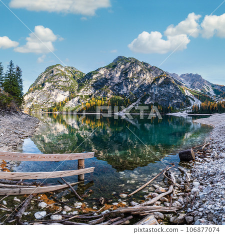 Autumn peaceful alpine lake Braies or Pragser Wildsee. Fanes-Sennes-Prags national park, South Tyrol, Dolomites Alps, Italy, Europe. 106877074
