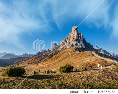 Mountain sunny evening peaceful view from Giau Pass. Mountain sunny evening peaceful view from Giau Pass. 106877078