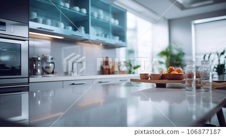 Blurred modern kitchen view. Scandinavian kitchen, minimalist design white accents. Ideal for product display or design layouts Blurred modern kitchen view. Scandinavian kitchen, minimalist design white accents. Ideal for product display or design layouts 106877187