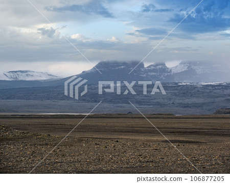 Iceland autumn tundra landscape near Haoldukvisl glacier, Iceland. Glacier tongue slides from the Vatnajokull icecap or Vatna Glacier near subglacial Esjufjoll volcano. Not far from Iceland Ring Road. 106877205