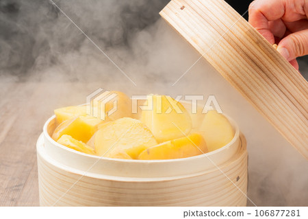 Fluffy sweet potato, open lid Fluffy sweet potato, open lid 106877281