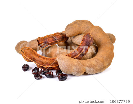 fresh tamarind fruits isolated on white. 106877759