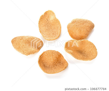 Shrimp rice crackers in thai food isolated on white background, cornflakes, crisp rice,Thai snack. Shrimp rice crackers in thai food isolated on white background, cornflakes, crisp rice,Thai snack. 106877784