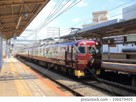 Sightseeing Limited Express "Awoyoshi" entering Yamato-Saidaiji Station on the Kintetsu Nara Line Sightseeing Limited Express "Awoyoshi" entering Yamato-Saidaiji Station on the Kintetsu Nara Line 106879405