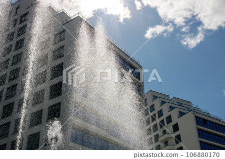 High jets of water fountain in the city High jets of water fountain in the city 106880170