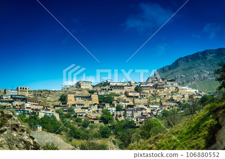 Village of Chokh in Dagestan. Facades of houses located in tiers on a steep slope, summer landscape. 106880552
