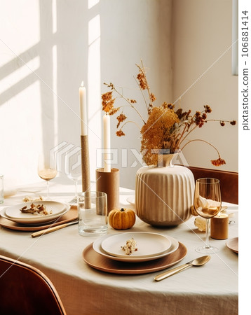 Autumn table decor, brown and beige fall home interior decoration, afternoon light Autumn table decor, brown and beige fall home interior decoration, afternoon light 106881414