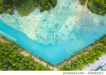Aerial view of Shirogane Blue Pond in Biei, Hokkaido 106882051