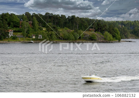 Swedish speed boat in Stockholm Archipelago on the Baltic Sea - Sweden 106882132