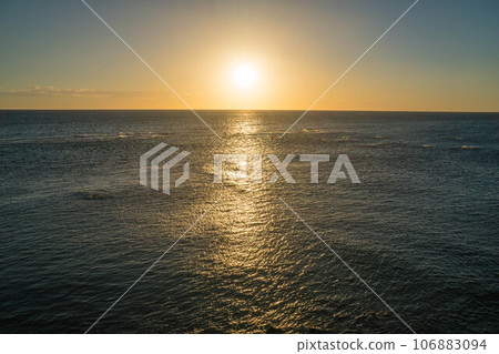 Fukui A beautiful sunset that colors the Sea of Japan from Tojinbo in summer 106883094