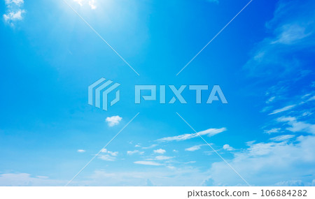 Blue sky and white clouds and sun Blue sky and white clouds and sun 106884282
