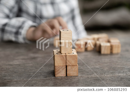 hands kid playing the wooden block game is a way to learn, and develop a way of thinking about concepts, potential and the brain hands kid playing the wooden block game is a way to learn, and develop a way of thinking about concepts, potential and the brain 106885293