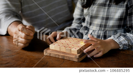 hands kid playing the wooden block game is a way to learn, and develop a way of thinking about concepts, potential and the brain hands kid playing the wooden block game is a way to learn, and develop a way of thinking about concepts, potential and the brain 106885295