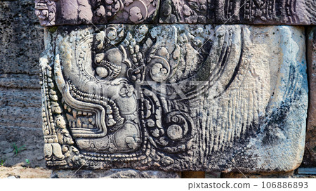 Mysterious Ancient ruins Banteay Srei temple - famous Cambodian landmark, Angkor Wat complex of temples. Siem Reap, Cambodia. Mysterious Ancient ruins Banteay Srei temple - famous Cambodian landmark, Angkor Wat complex of temples. Siem Reap, Cambodia. 106886893