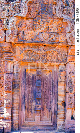 Mysterious Ancient ruins Banteay Srei temple - famous Cambodian landmark, Angkor Wat complex of temples. Siem Reap, Cambodia. 106886903