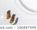 Two aroma oil bottles. An image of nature, organic, and beauty. 106887449