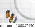 Two aroma oil bottles. An image of nature, organic, and beauty. 106887450