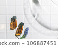 Two aroma oil bottles. An image of nature, organic, and beauty. 106887451