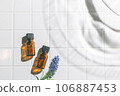 Two aroma oil bottles. An image of nature, organic, and beauty. 106887453