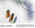 Two aroma oil bottles. An image of nature, organic, and beauty. 106887454