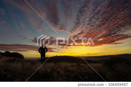human silhouette in the twilight 106889487
