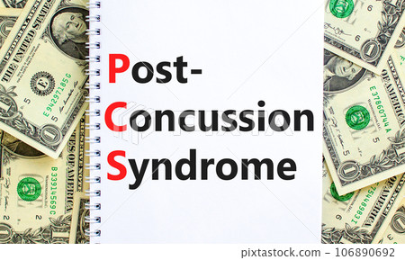 PCS post-concussion syndrome symbol. Concept words PCS post-concussion syndrome on white note on a beautiful background from dollar bills. Medical and PCS post-concussion syndrome concept. Copy space. 106890692