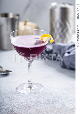 Fall purple gin sour cocktail, violet or purple rain 106891345