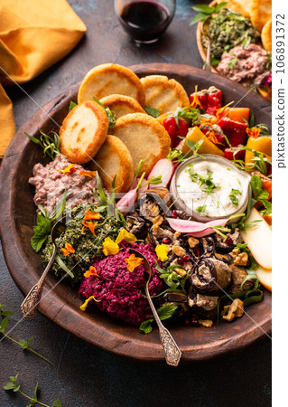 Vegetarian appetizers Georgian cuisine, bread, dips and cheese Vegetarian appetizers Georgian cuisine, bread, dips and cheese 106891372