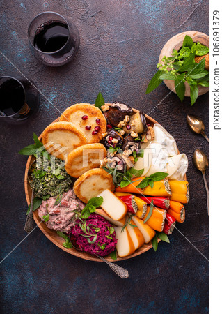 Vegetarian appetizers Georgian cuisine, bread, dips and cheese Vegetarian appetizers Georgian cuisine, bread, dips and cheese 106891379