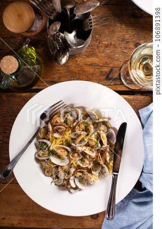 Seafood pasta with clams, fresh pasta linguine Seafood pasta with clams, fresh pasta linguine 106891398