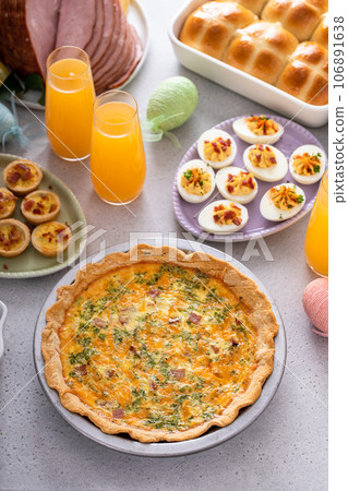 Homemade ham and cheese quiche for Easter brunch 106891638