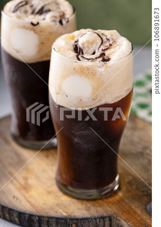 Dark stout beer ice cream float, dessert idea for St Patricks day 106891673